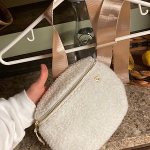 Adorable white fuzzy bum bag